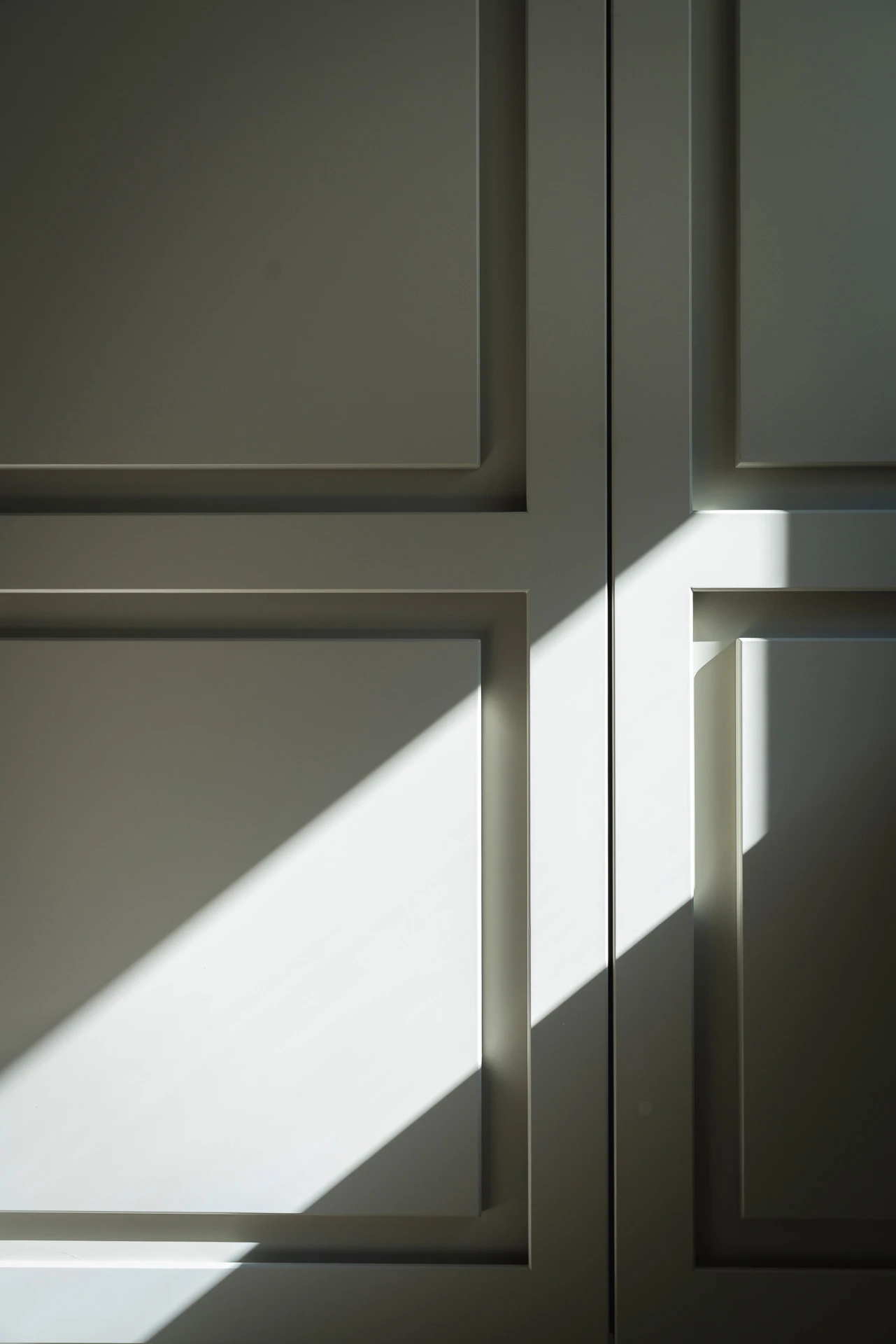 Custom designer kitchen: detail of the lacquered framed doors, handcrafted with exposed frames